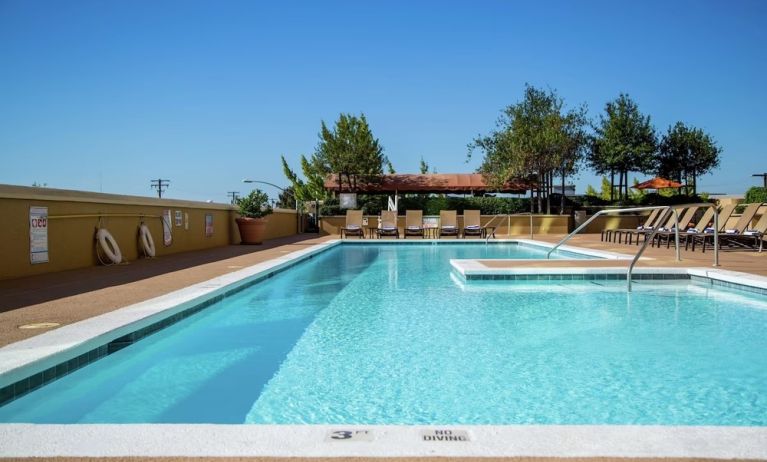 Relaxing outdoor pool at DoubleTree By Hilton Modesto.
