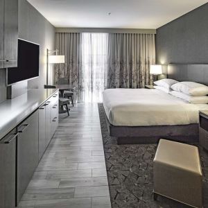 Day use room with mini kitchen and TV at DoubleTree By Hilton Modesto.