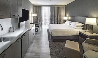 Day use room with mini kitchen and TV at DoubleTree By Hilton Modesto.
