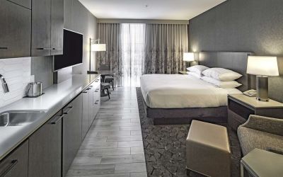 Day use room with mini kitchen and TV at DoubleTree By Hilton Modesto.