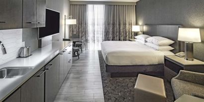 Day use room with mini kitchen and TV at DoubleTree By Hilton Modesto.