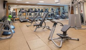Fully equipped fitness center at Hilton Bellevue.