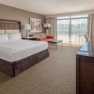 Day use room with work desk and sofa at Hilton Bellevue.