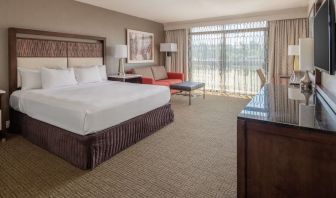 Day use room with work desk and sofa at Hilton Bellevue.