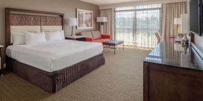 Day use room with work desk and sofa at Hilton Bellevue.