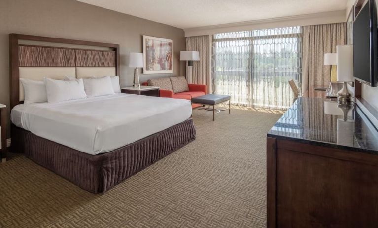 Day use room with work desk and sofa at Hilton Bellevue.