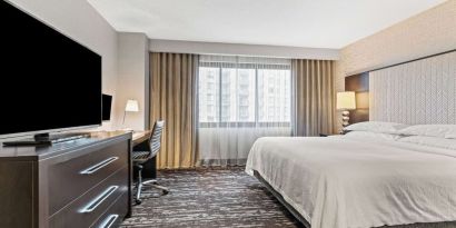 Day use room with natural light and work desk at Embassy Suites By Hilton Crystal City-National Airport.