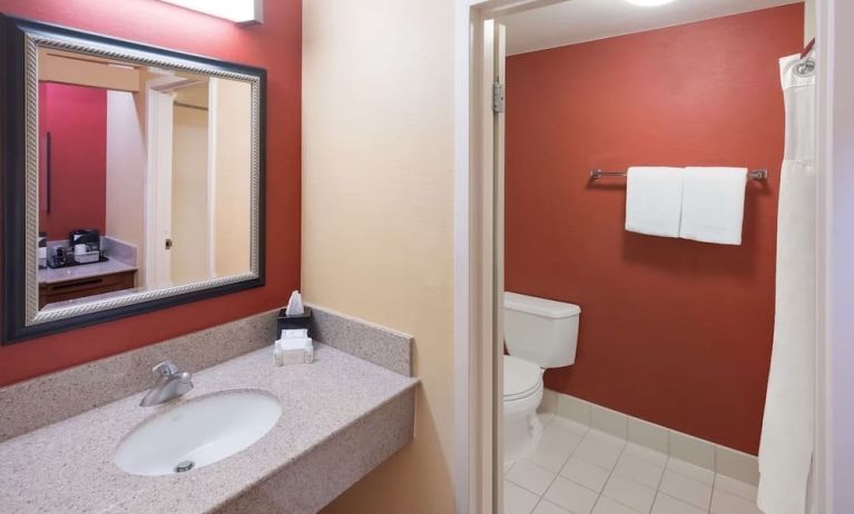 Private guest bathroom with shower at Sonesta Select Detroit Auburn Hills.