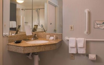 Private guest bathroom with shower and free toiletries at Sonesta Select Columbia.