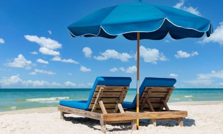 Beach sun loungers at DoubleTree Beach Resort By Hilton Tampa Bay - North Redington.