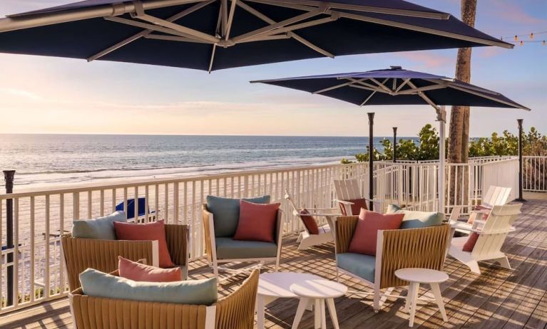 Outdoor furniture with beautiful view at DoubleTree Beach Resort By Hilton Tampa Bay - North Redington.