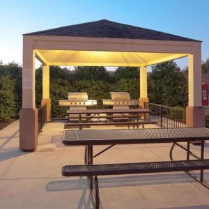Picnic and BBQ area at Sonesta Simply Suites Plano Frisco.