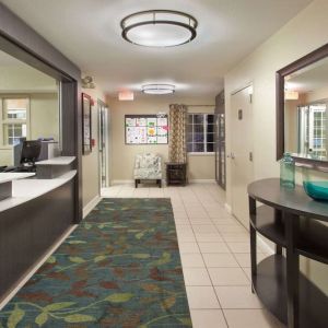 Hotel reception at Sonesta Simply Suites Dallas Las Colinas.