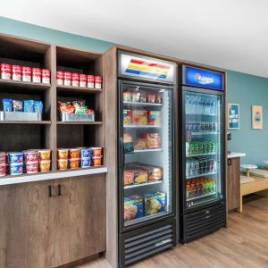 Hotel reception and convenience store at Sonesta Simply Suites Austin South.