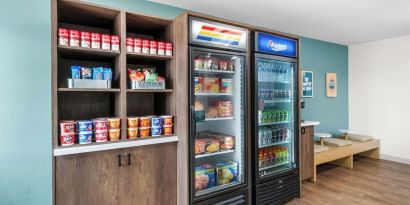 Hotel reception and convenience store at Sonesta Simply Suites Austin South.