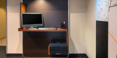 Business center with computer and printer at Sonesta Simply Suites Seattle Renton.