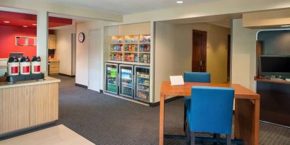 Lobby' coffee service and workspace at Sonesta Simply Suites Seattle Renton.