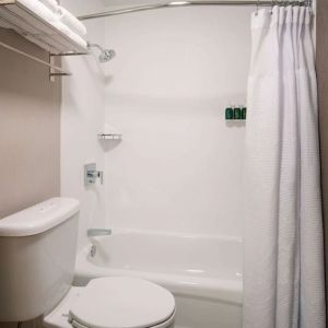 Private guest bathroom with shower at Sonesta Select Seattle Renton.
