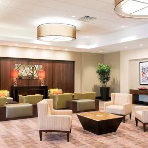 Lobby and coworking lounge at DoubleTree By Hilton Grand Rapids Airport.