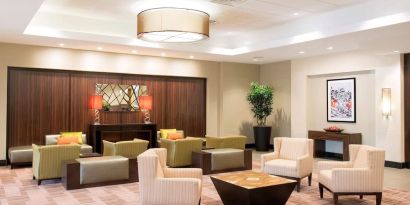 Lobby and coworking lounge at DoubleTree By Hilton Grand Rapids Airport.