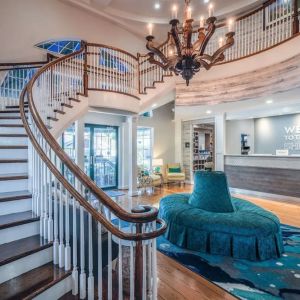 Lobby and coworking lounge at Hampton Inn & Suites Amelia Island-Historic Harbor Front.