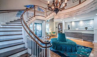 Lobby and coworking lounge at Hampton Inn & Suites Amelia Island-Historic Harbor Front.