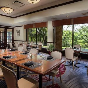 Dining area with a beautiful view perfect for coworking at DoubleTree By Hilton Lisle-Naperville.