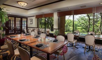 Dining area with a beautiful view perfect for coworking at DoubleTree By Hilton Lisle-Naperville.