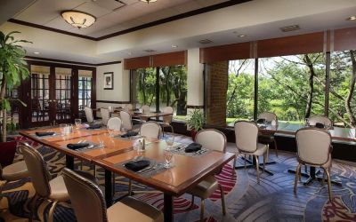 Dining area with a beautiful view perfect for coworking at DoubleTree By Hilton Lisle-Naperville.