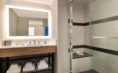 Guest bathroom with shower at DoubleTree By Hilton Canton Downtown.