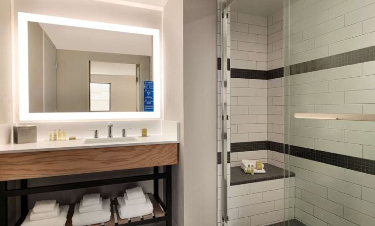 Guest bathroom with shower at DoubleTree By Hilton Canton Downtown.