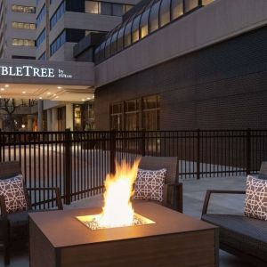 Firepit surrounded by seats at DoubleTree By Hilton Canton Downtown.