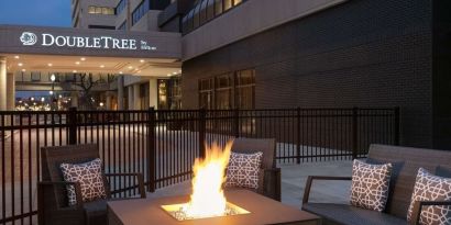Firepit surrounded by seats at DoubleTree By Hilton Canton Downtown.