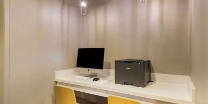 Business center with computer, printer and ergonomic chair at Sonesta ES Suites Parsippany Morris Plains.