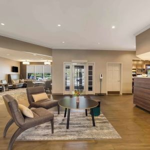 Lobby lounge with convenience store at Sonesta ES Suites Parsippany Morris Plains.