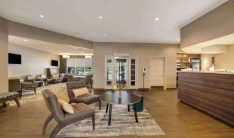Lobby lounge with convenience store at Sonesta ES Suites Parsippany Morris Plains.