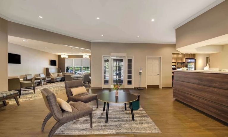 Lobby lounge with convenience store at Sonesta ES Suites Parsippany Morris Plains.