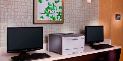 Business center with computers and printer at Sonesta ES Suites Birmingham Homewood.