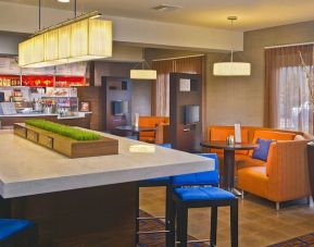 Lobby workspace at Sonesta Select Tinton Falls Eatontown.