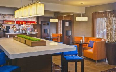 Lobby workspace at Sonesta Select Tinton Falls Eatontown.