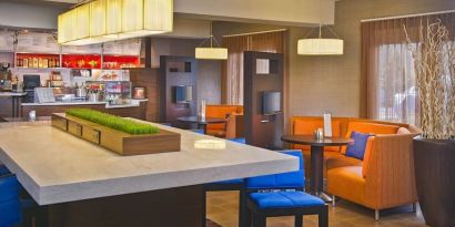 Lobby workspace at Sonesta Select Tinton Falls Eatontown.