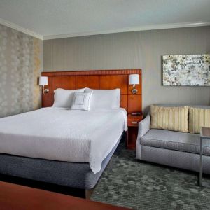 King bed at Sonesta Select Tinton Falls Eatontown.