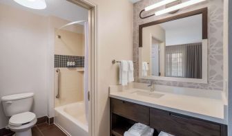 Private guest bathroom with combined shower and tub at Sonesta ES Suites Austin The Domain Area.