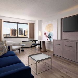 Room workspace with living area at Sonesta White Plains Downtown.