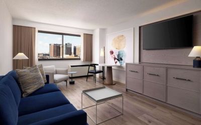 Room workspace with living area at Sonesta White Plains Downtown.