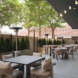 Hotel terrace with seating area, perfect for coworking at Sonesta White Plains Downtown.