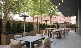 Hotel terrace with seating area, perfect for coworking at Sonesta White Plains Downtown.