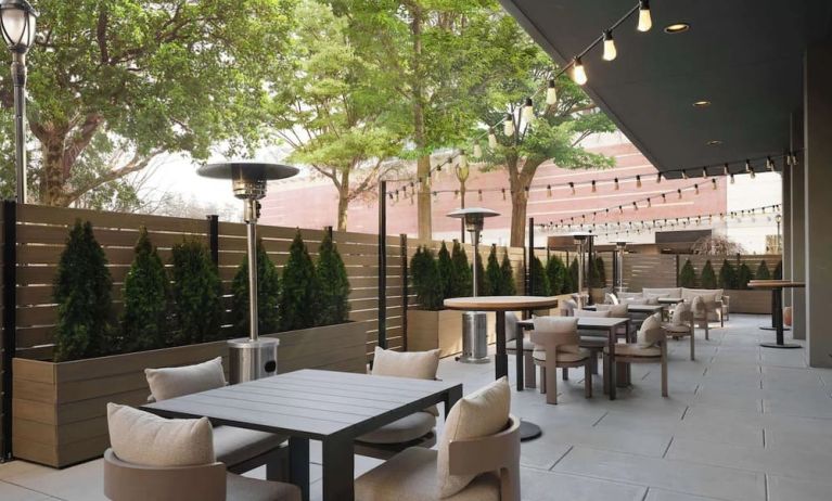 Hotel terrace with seating area, perfect for coworking at Sonesta White Plains Downtown.