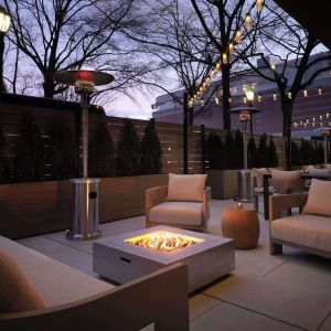 Patio with lounge seating and fire pit at Sonesta White Plains Downtown.