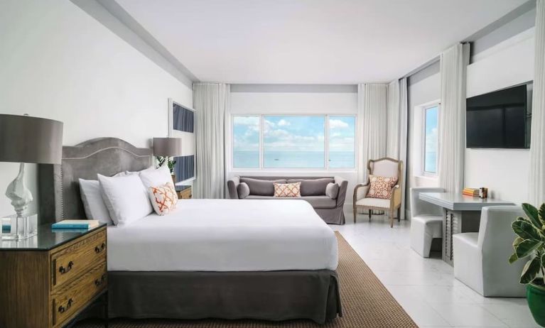 Bright and spacious day use room with workspace and lounge seating at Nautilus Sonesta Miami Beach.
